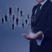 Businessman presenting a network of finance professionals, symbolizing the innovative trends in finance recruitment for 2024, with a focus on strategic networking and leveraging technology for talent acquisition