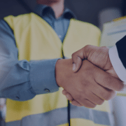 Engineering recruitment handshake symbolizing the successful hiring of top talent in a competitive market for Measured Ability.