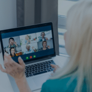 A woman participating in an online consulting meeting with multiple colleagues, reflecting the shift towards remote work in the consulting industry.