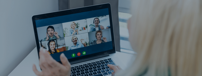 A woman participating in an online consulting meeting with multiple colleagues, reflecting the shift towards remote work in the consulting industry.
