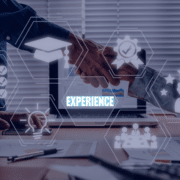 Two professionals shaking hands, with virtual icons representing skills and experience, encapsulating the strategy to bridge the experience gap for new graduates."