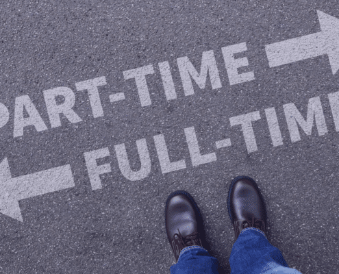 Person standing at a crossroads with arrows pointing to 'PART-TIME' and 'FULL-TIME', representing the choice between contract work and full-time employment.