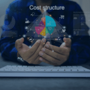 A business professional analyzing a cost structure chart on a digital interface, illustrating the cost-benefit analysis of outsourcing payroll services.